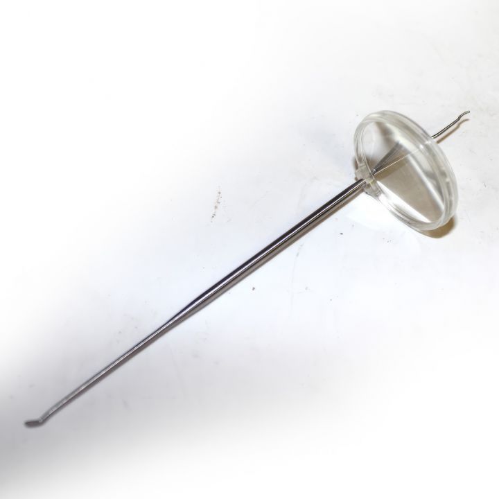 Nerezová lžička s lupou